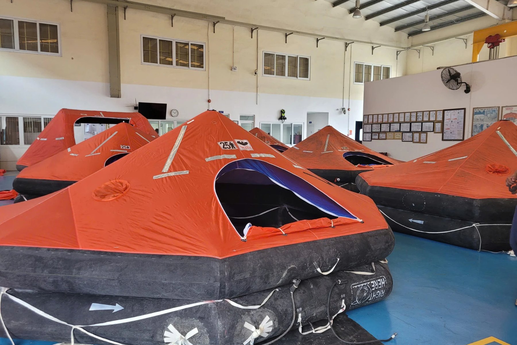 Liferafts inflated for servicing at the Mermaid workshop